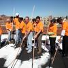 Mayor Bloomberg painting the millionth square foot of roof white in the Bronx